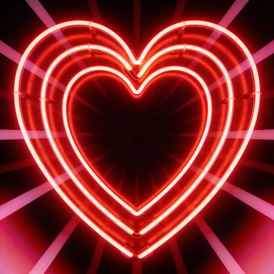 heart-pfp-red-glowing-neon-dark-background-tiktok Red glowing neon heart pfp with dark background and vibrant lighting effect ideal for TikTok and Discord edgy profiles